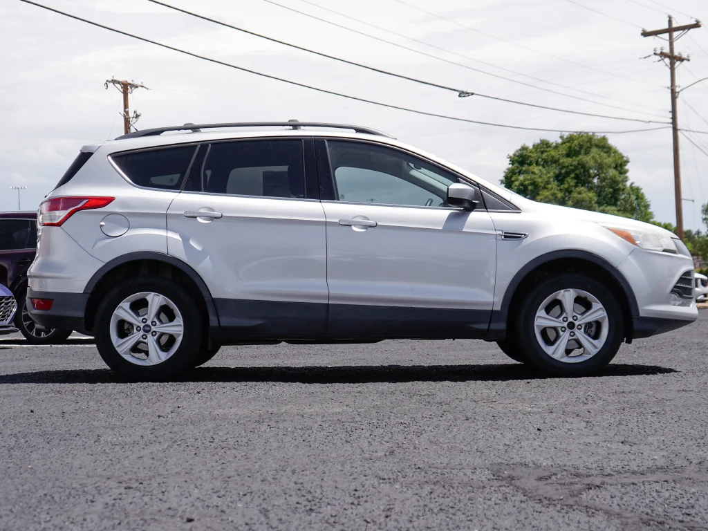 Used 2016 Ruby Red Metallic Tinted Clearcoat Ford SE image 16