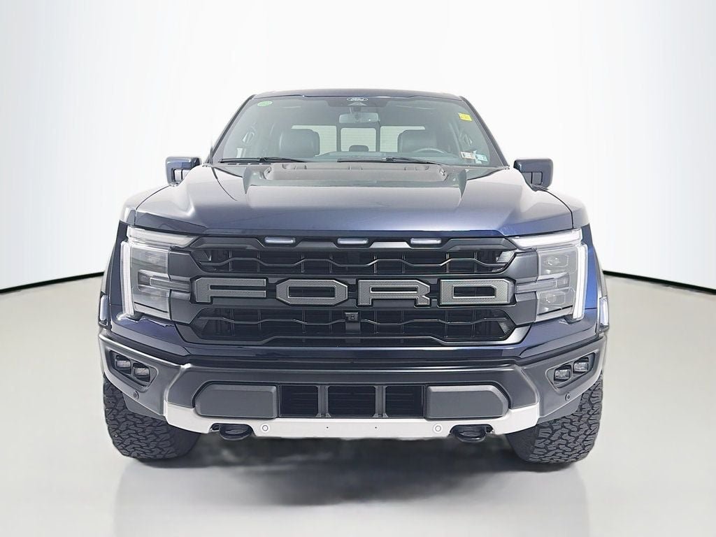 Used 2024 Antimatter Blue Metallic Ford Raptor 4WD SuperCrew 5.5