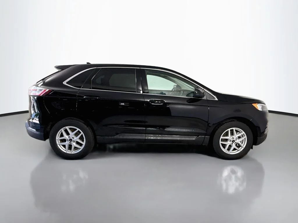 Used 2023 Agate Black Metallic Ford SEL image 12