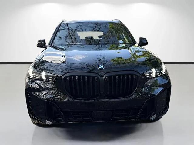 New 2026 Black Sapphire Metallic BMW xDrive50e image 8