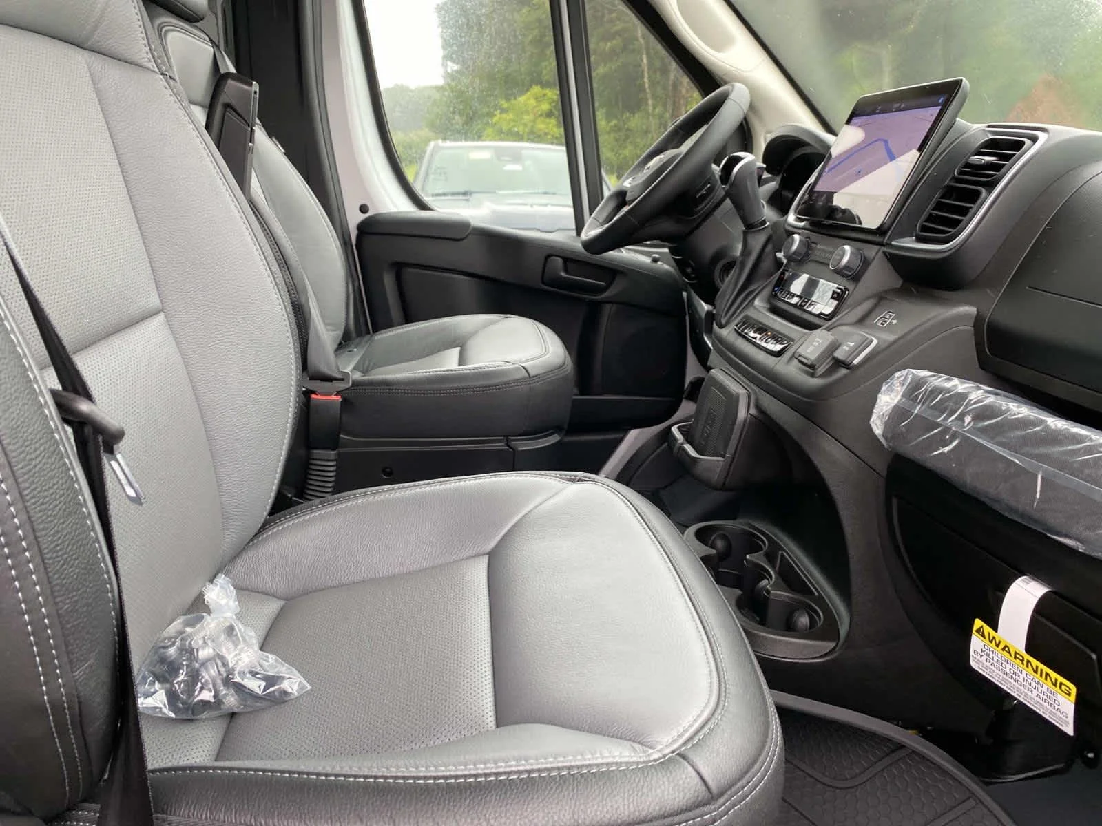 Used 2025 Bright Silver Metallic Clearcoat Ram SLT+ image 24