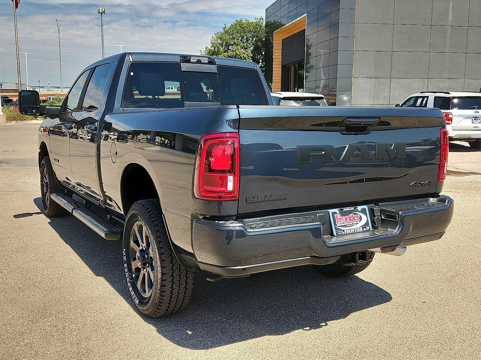 New 2026 Forged Blue Metallic  Paint Ram LARAMIE CREW CAB 4X4 6