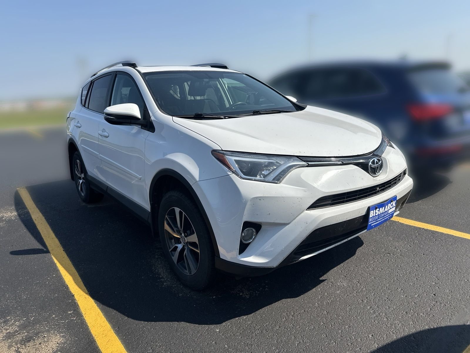 Used 2016 Toyota RAV4 XLE with VIN 2T3RFREV1GW519837 for sale in Mandan, ND