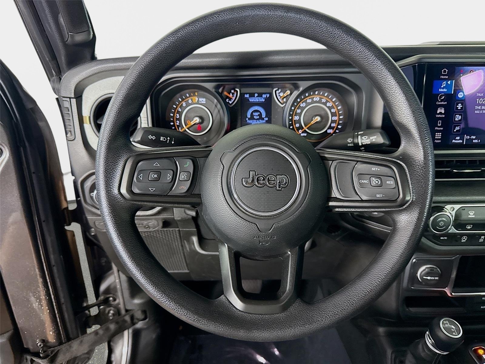 Used 2024 Granite Crystal Metallic Clearcoat Jeep Sport image 12