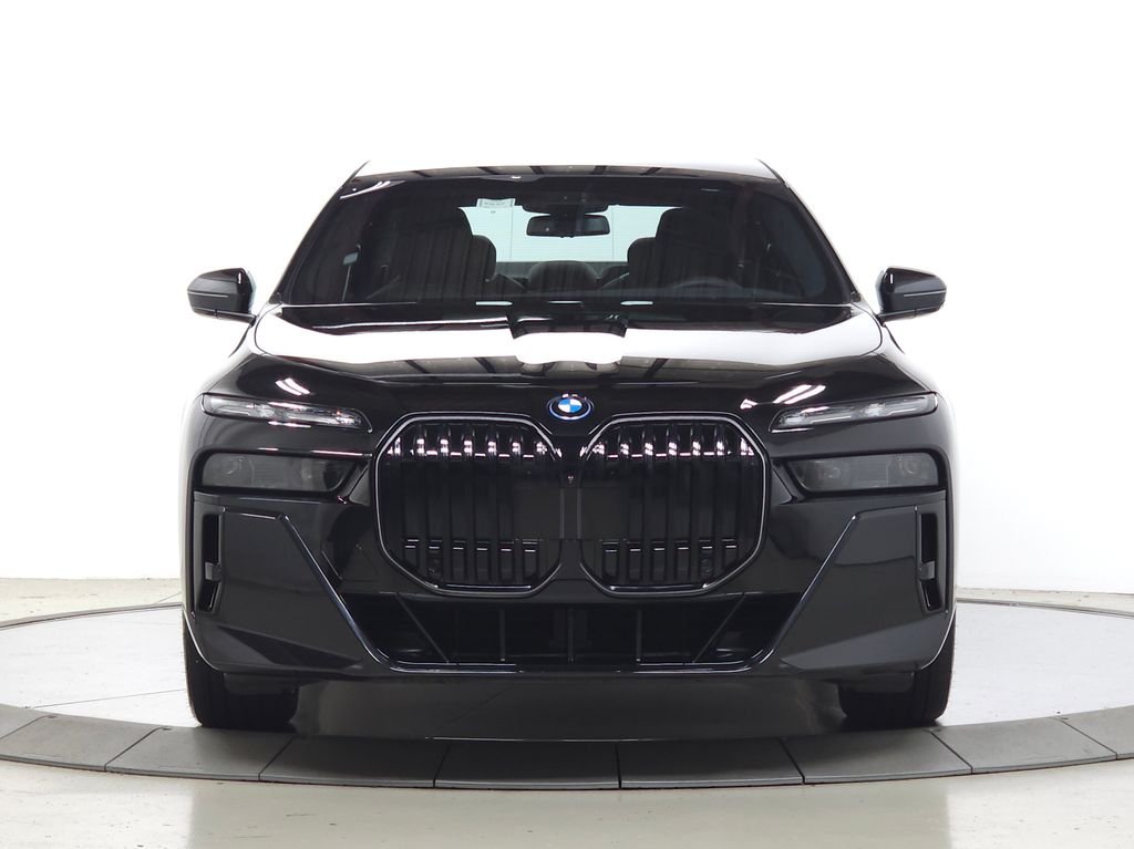 Used 2026 Black Sapphire Metallic BMW xDrive60 image 2