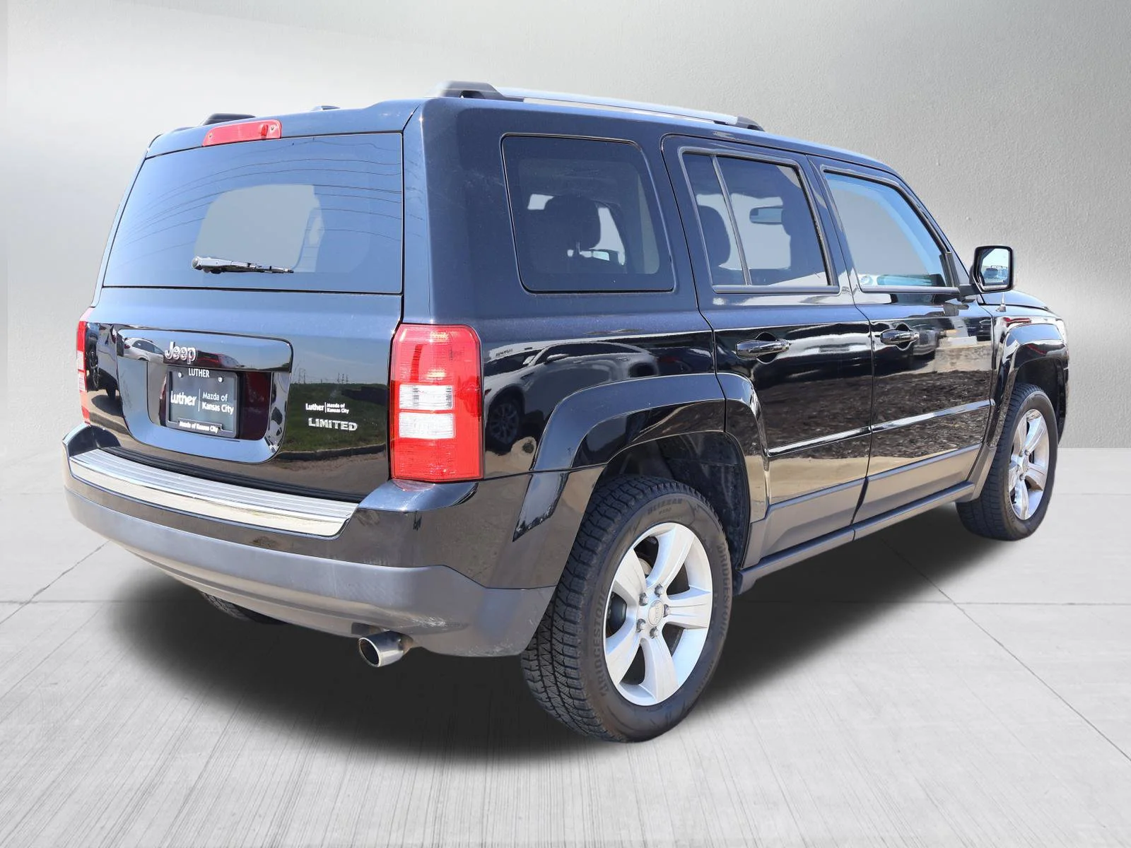 Used 2014 Black Clearcoat Jeep Limited image 7
