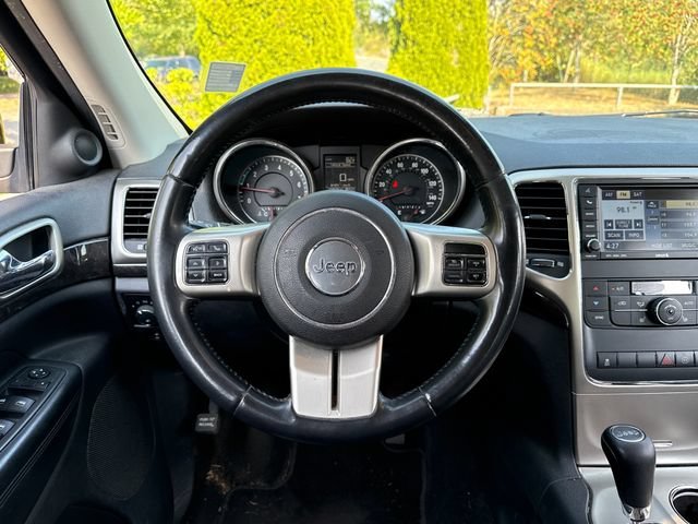 Used 2011 Blackberry Pearlcoat Jeep Laredo image 9