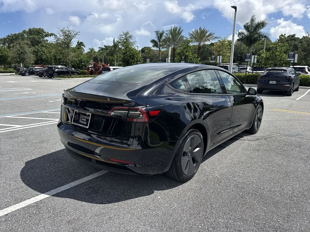 Used 2023 Solid Black Tesla  image 3