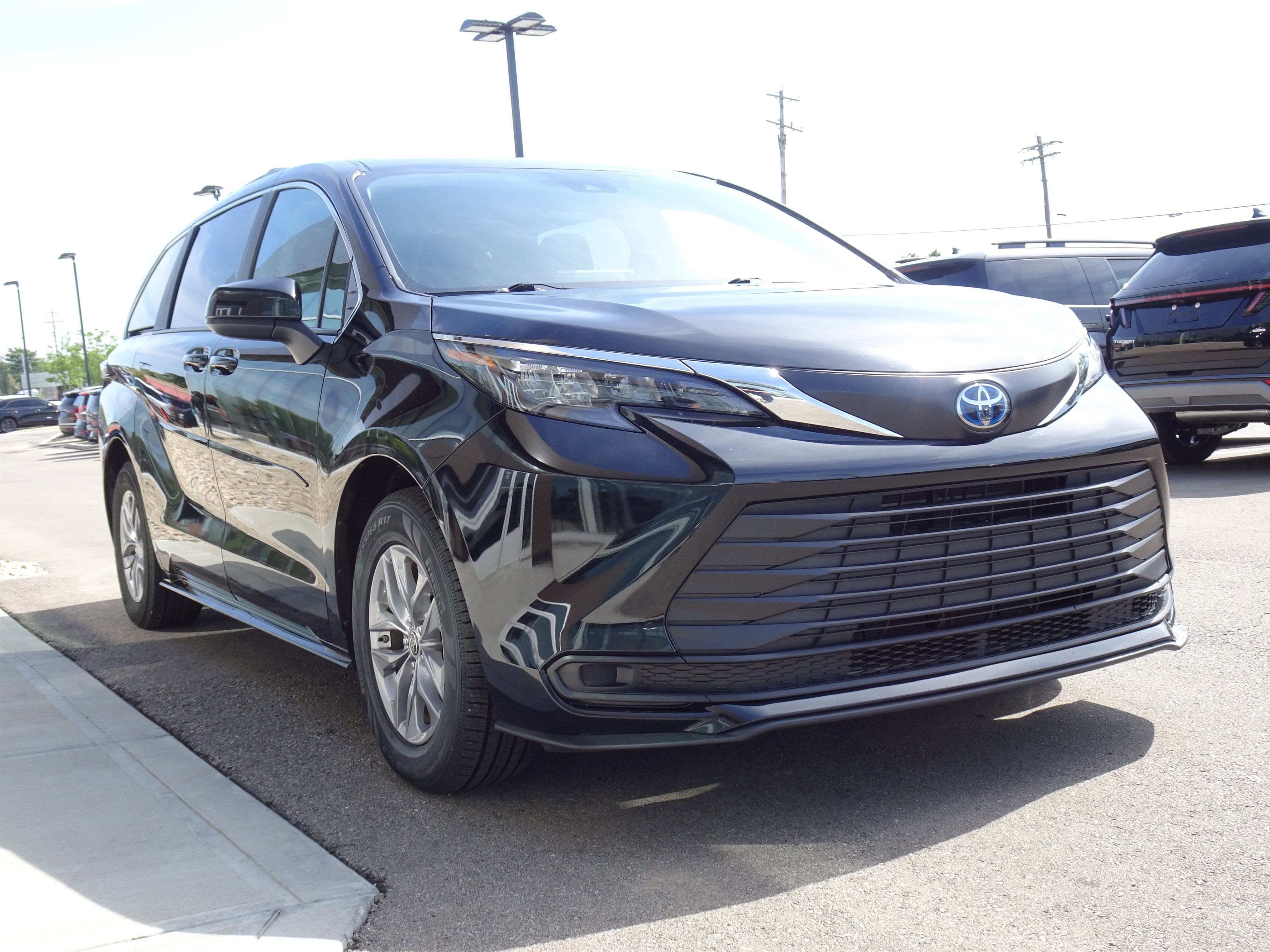 Used 2024 Midnight Black Metallic Toyota LE image 6