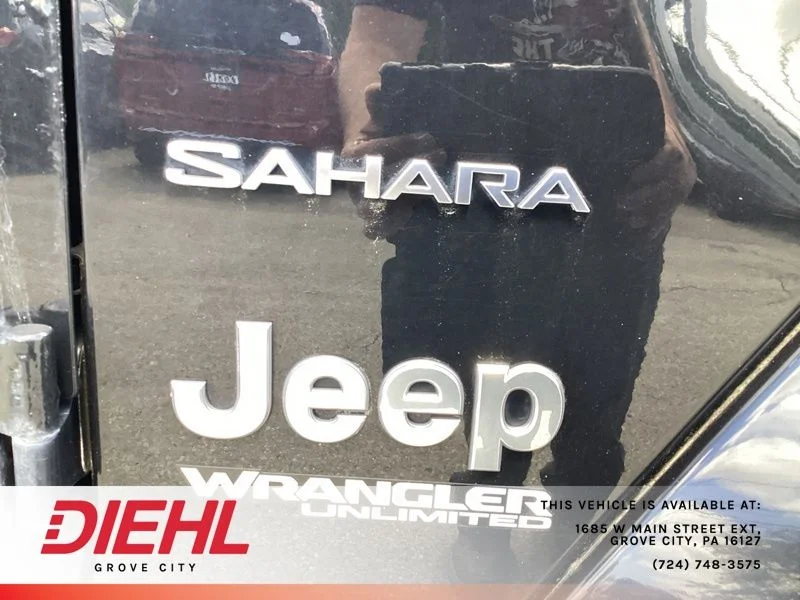 Used 2018 Black Jeep Unlimited Sahara image 7