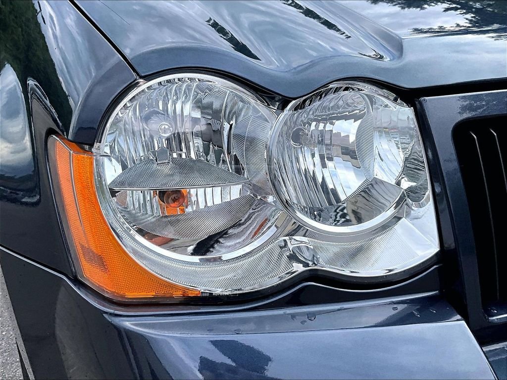 Used 2009 Modern Blue Pearlcoat Jeep Laredo image 31
