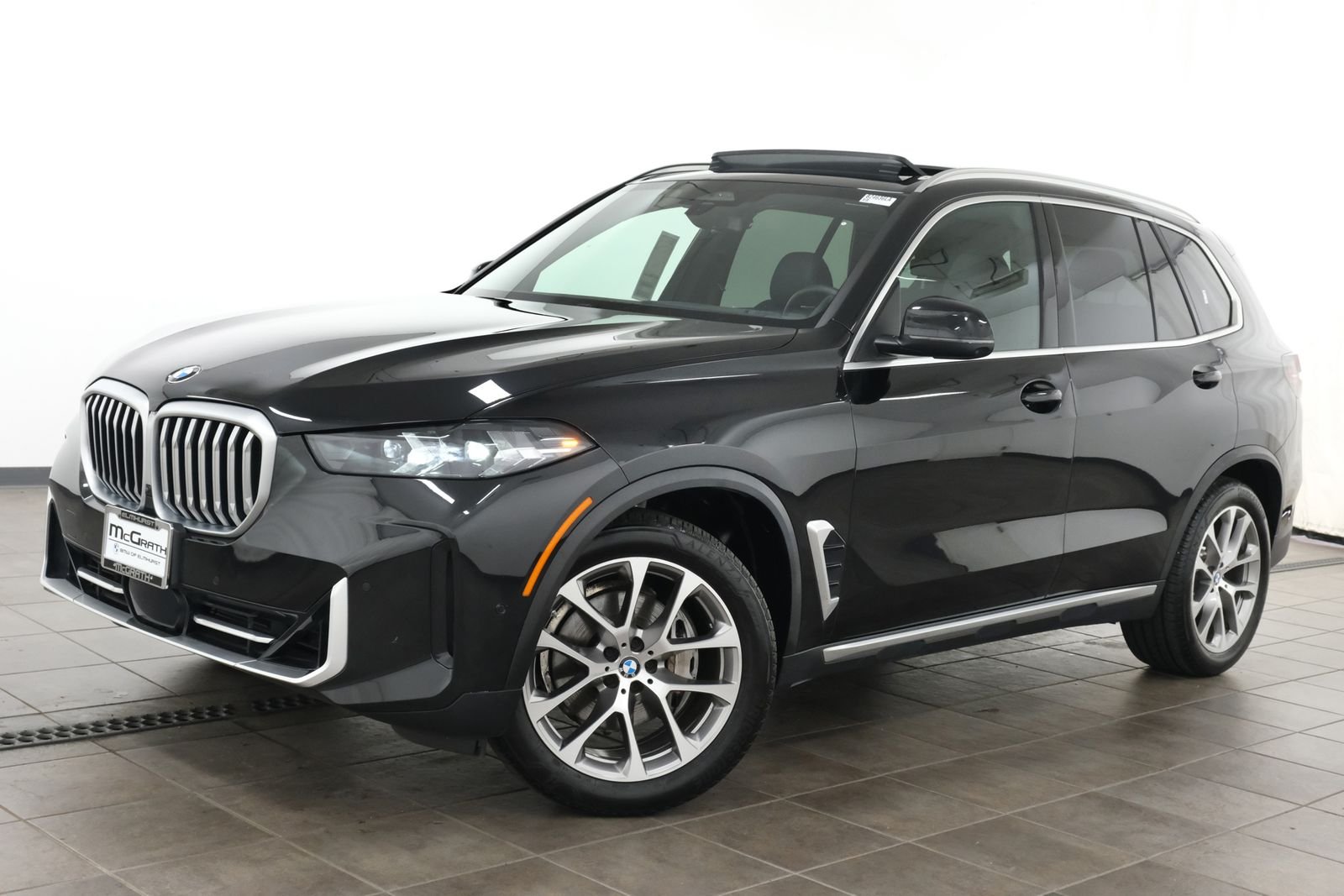 Certified Used 2024 Black Sapphire Metallic BMW xDrive40i image 1