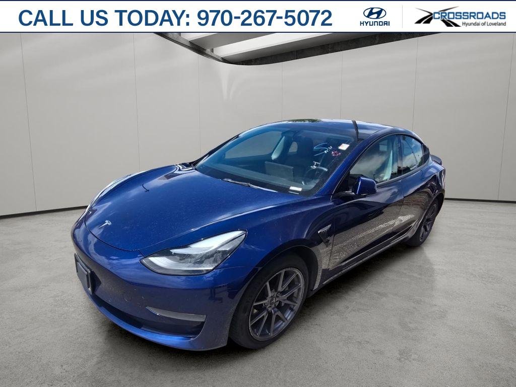 Used 2022 Deep Blue Metallic Tesla Base image 1