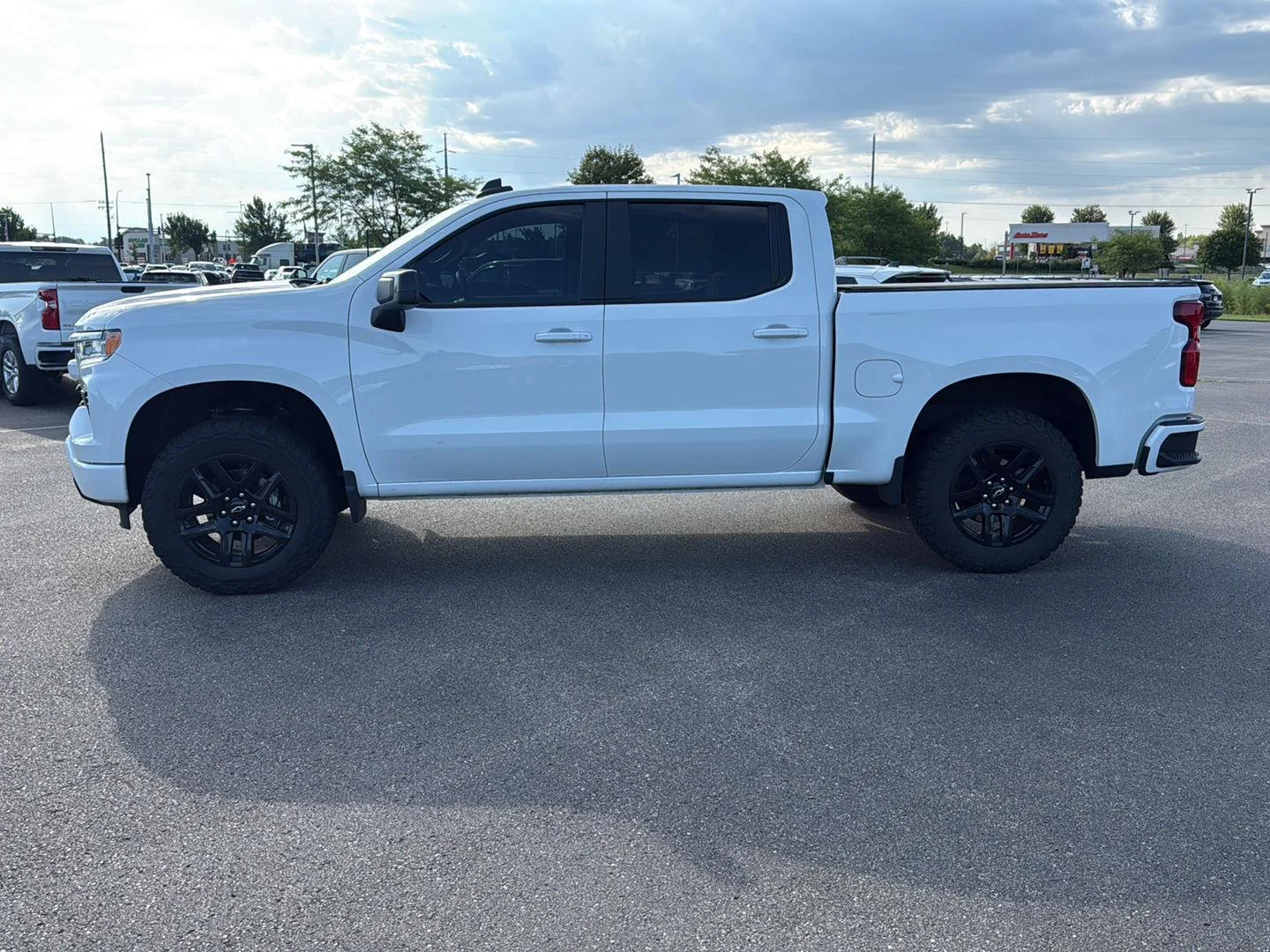 Used 2024 Chevrolet Silverado 1500 RST with VIN 1GCUDEEL6RZ205692 for sale in Waconia, Minnesota
