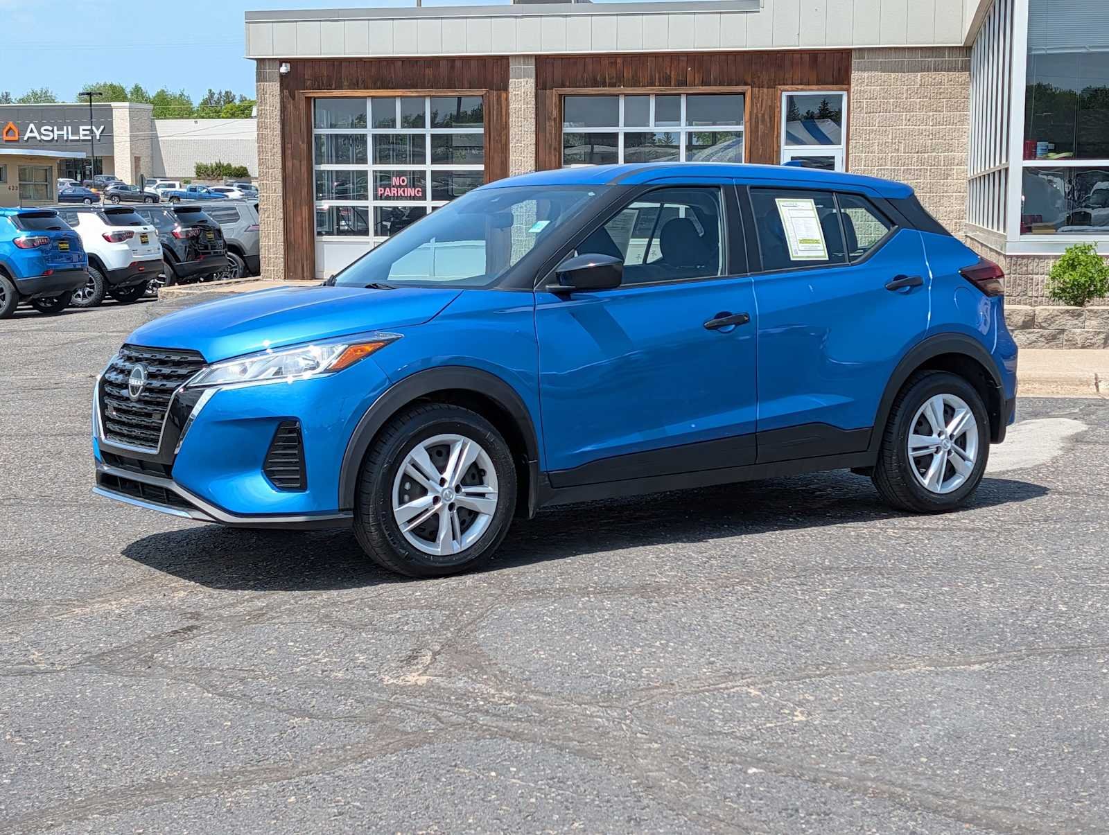 Used 2024 Electric Blue Metallic Nissan S image 3