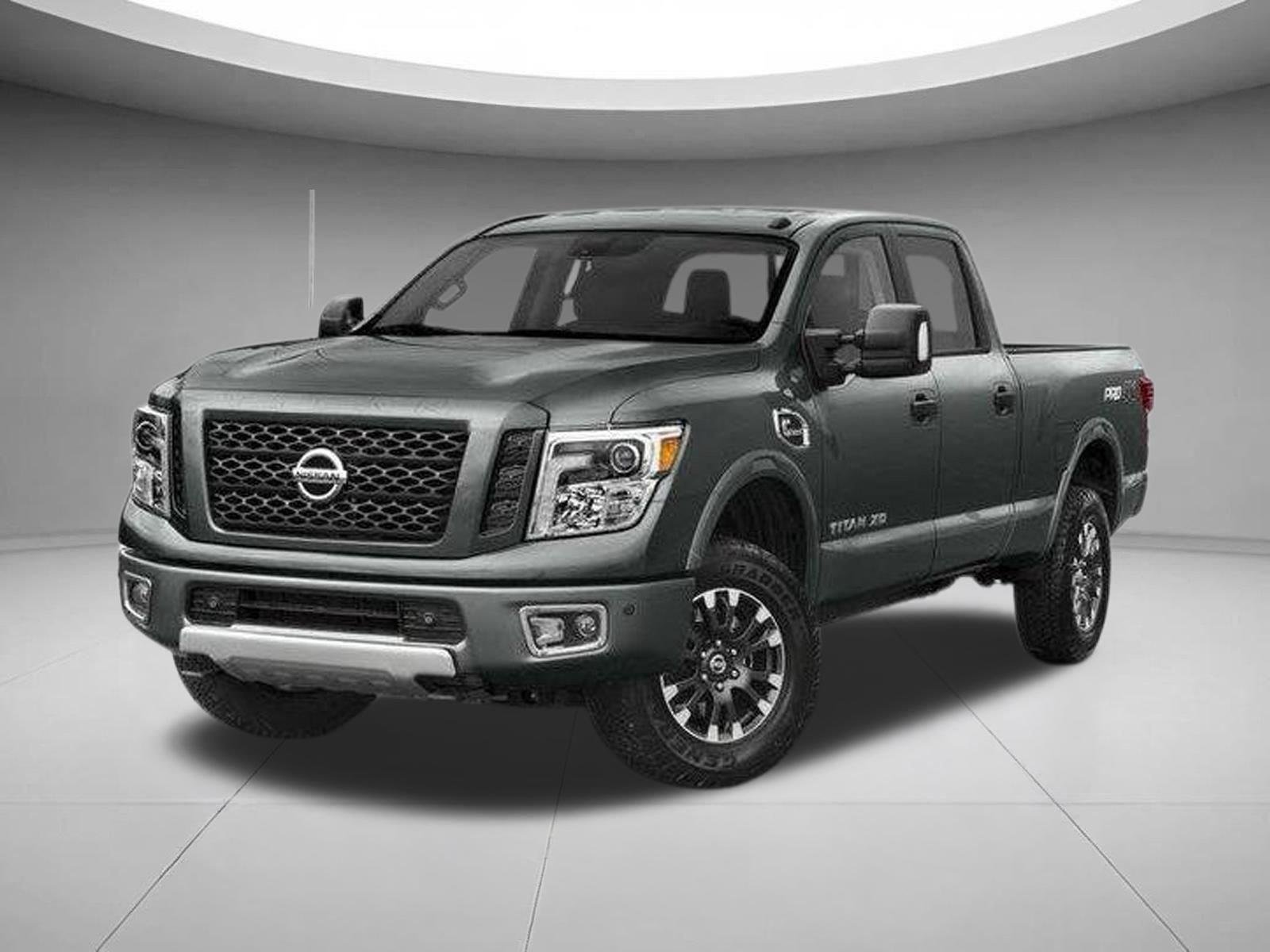 Used 2017 Magnetic Black Nissan PRO-4X image 1