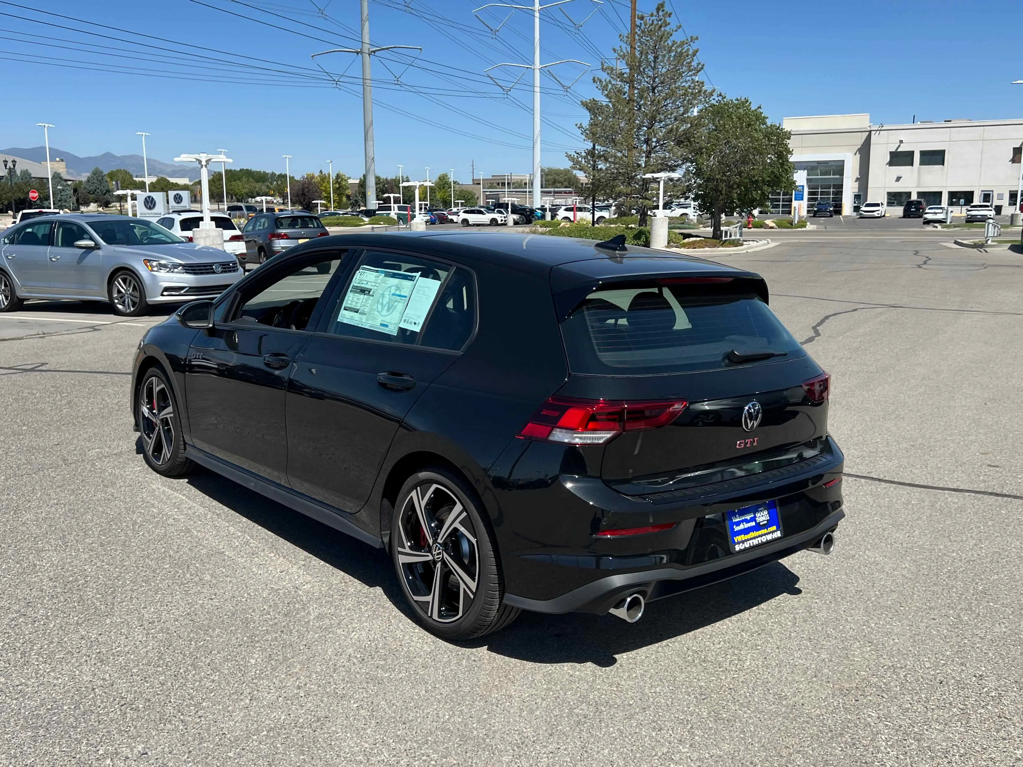 New 2025 Black Volkswagen SE image 11