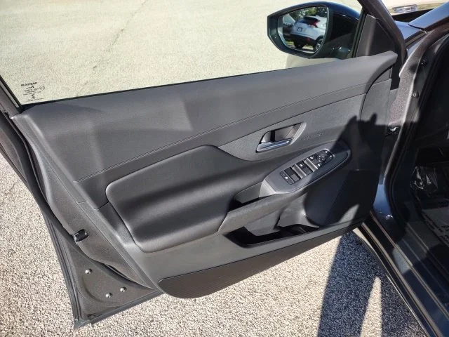Used 2027 Gun Metallic Nissan SV image 11