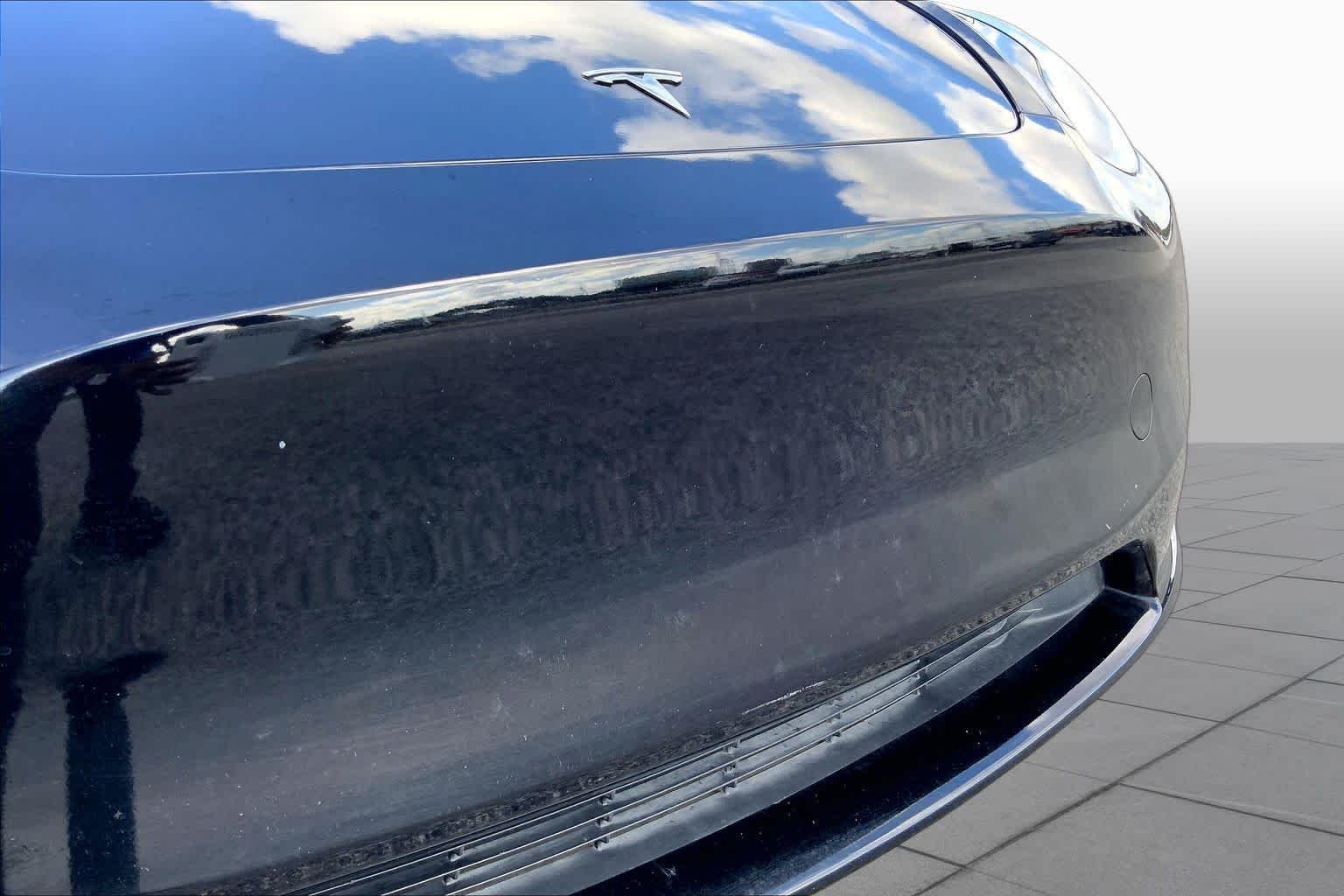 Used 2024 Solid Black Tesla  image 27
