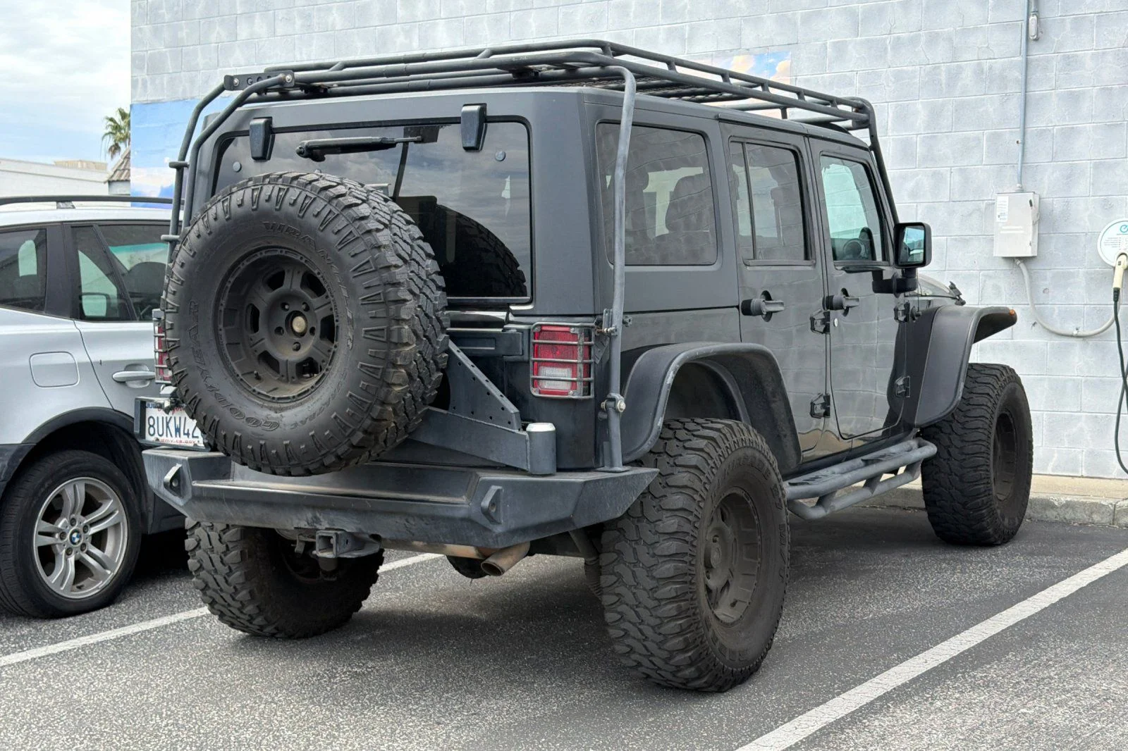 Used 2013 Black Jeep Unlimited Sport image 5