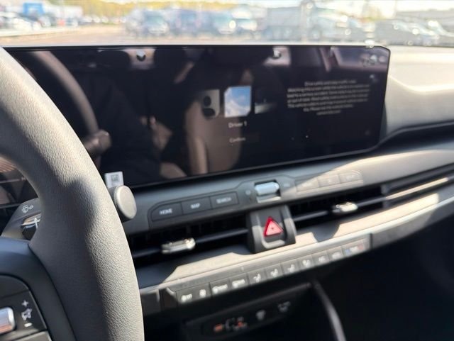 New 2026 Currant Red Kia LXS image 16