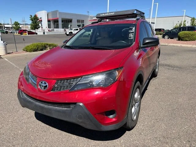 Used 2013 Barcelona Red Metallic Toyota LE image 1