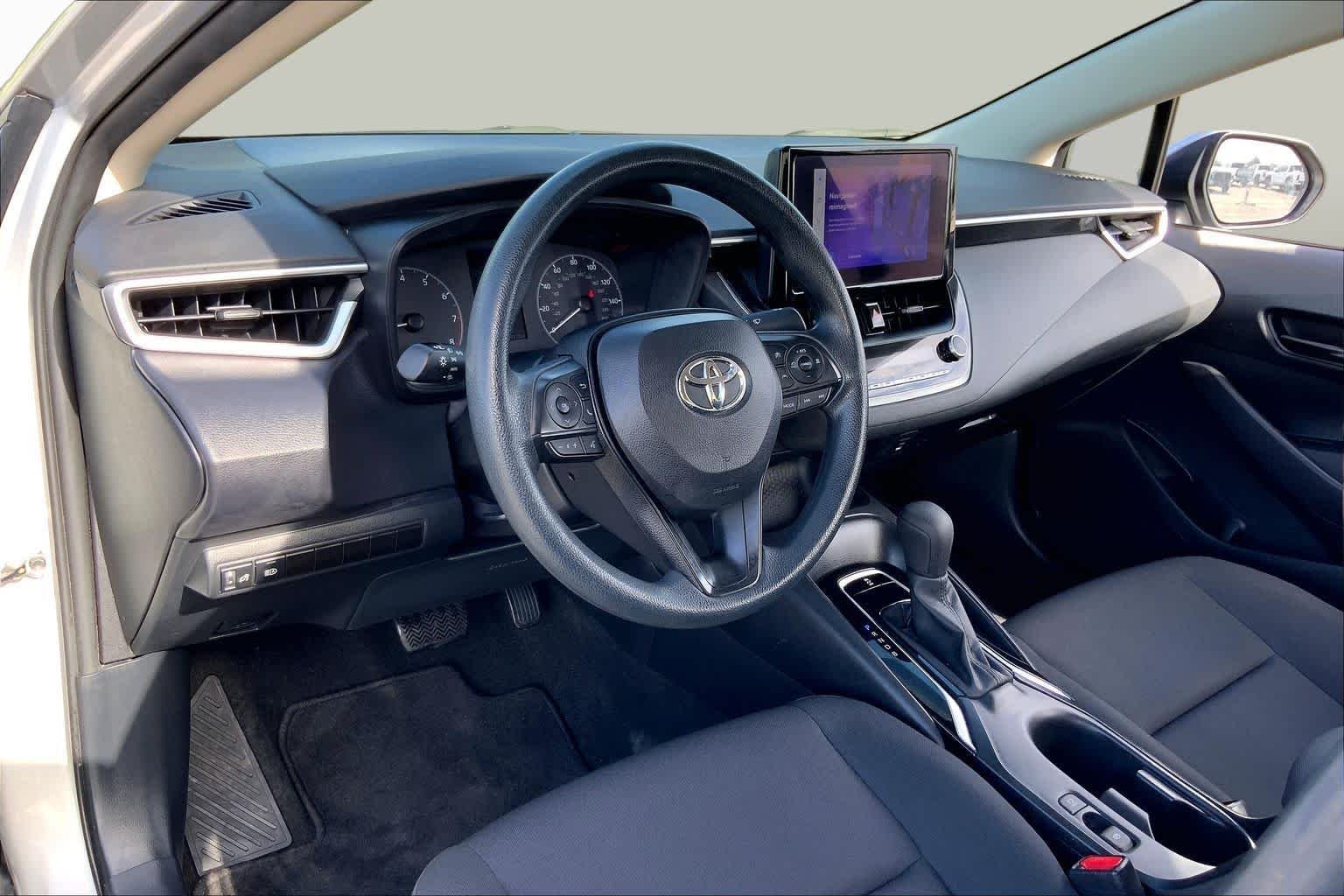 Used 2024 Classic Silver Metallic Toyota LE image 17
