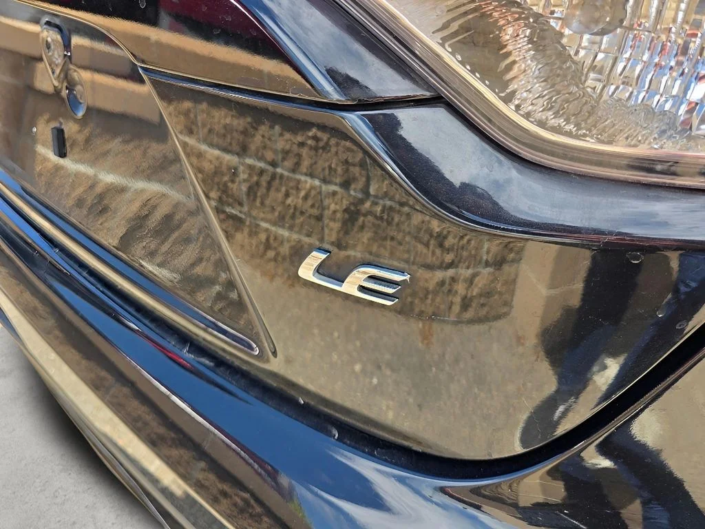 Used 2021 Black Sand Pearl Toyota LE image 17