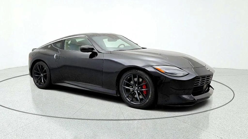 Used 2024 Black Diamond Pearl Nissan Performance Automatic image 3