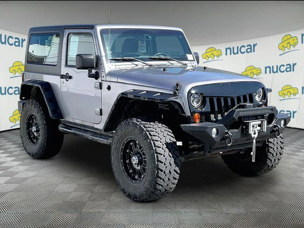 Used 2013 Billet Metallic Clearcoat Jeep Sport image 1