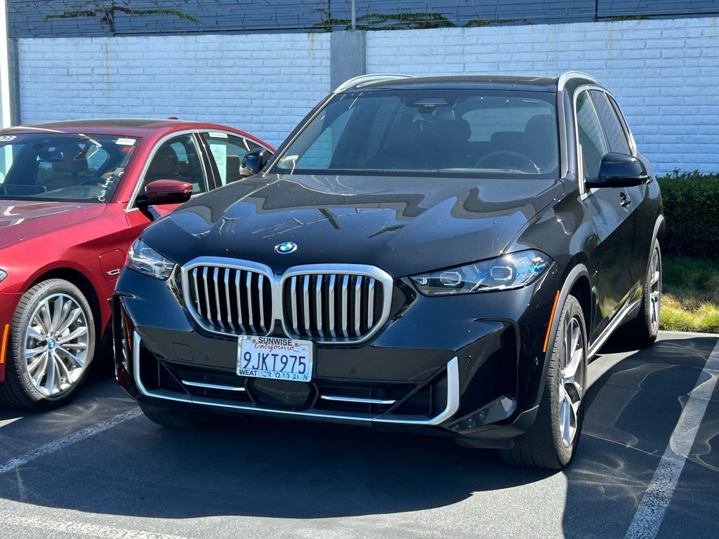 Certified Used 2024 Black Sapphire Metallic BMW xDrive50e image 2