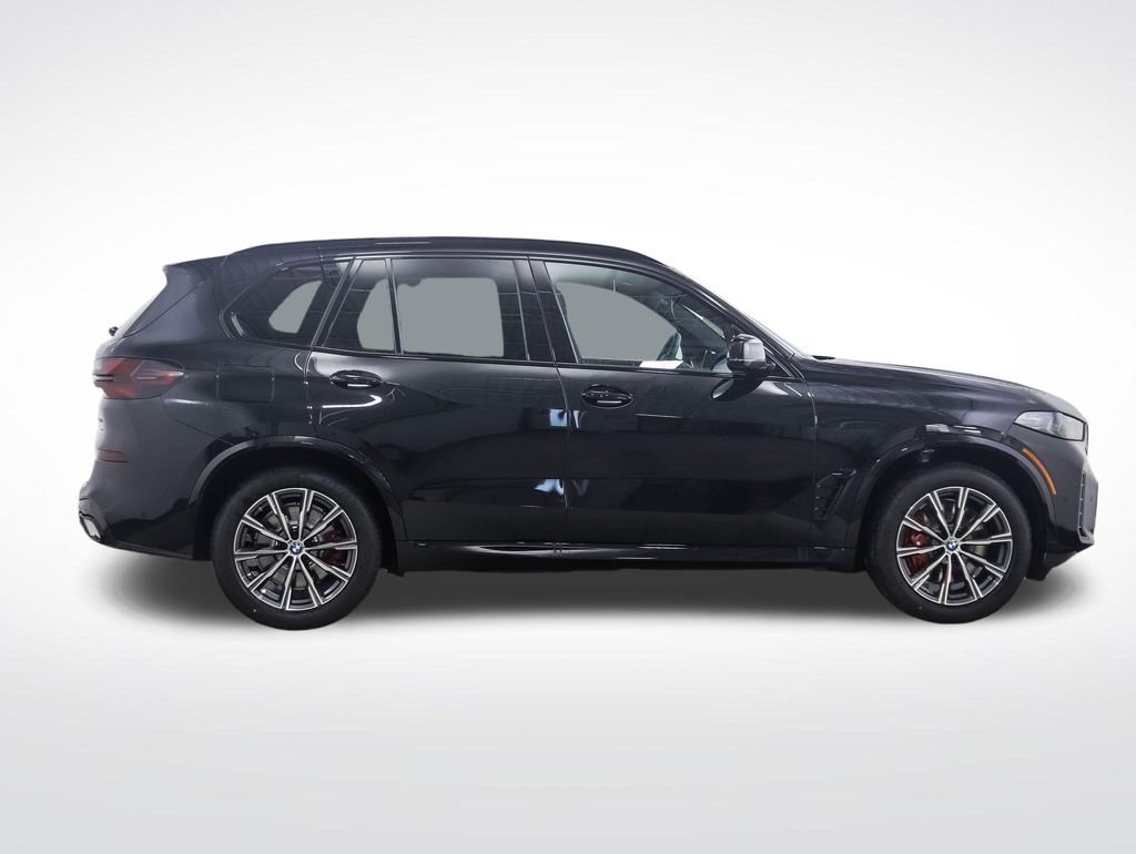 New 2026 Black Sapphire Metallic BMW xDrive50e image 6
