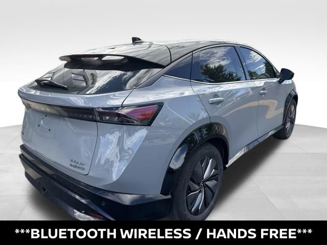 Certified Used 2024 Gray Nissan EVOLVE+ e-4ORCE image 3