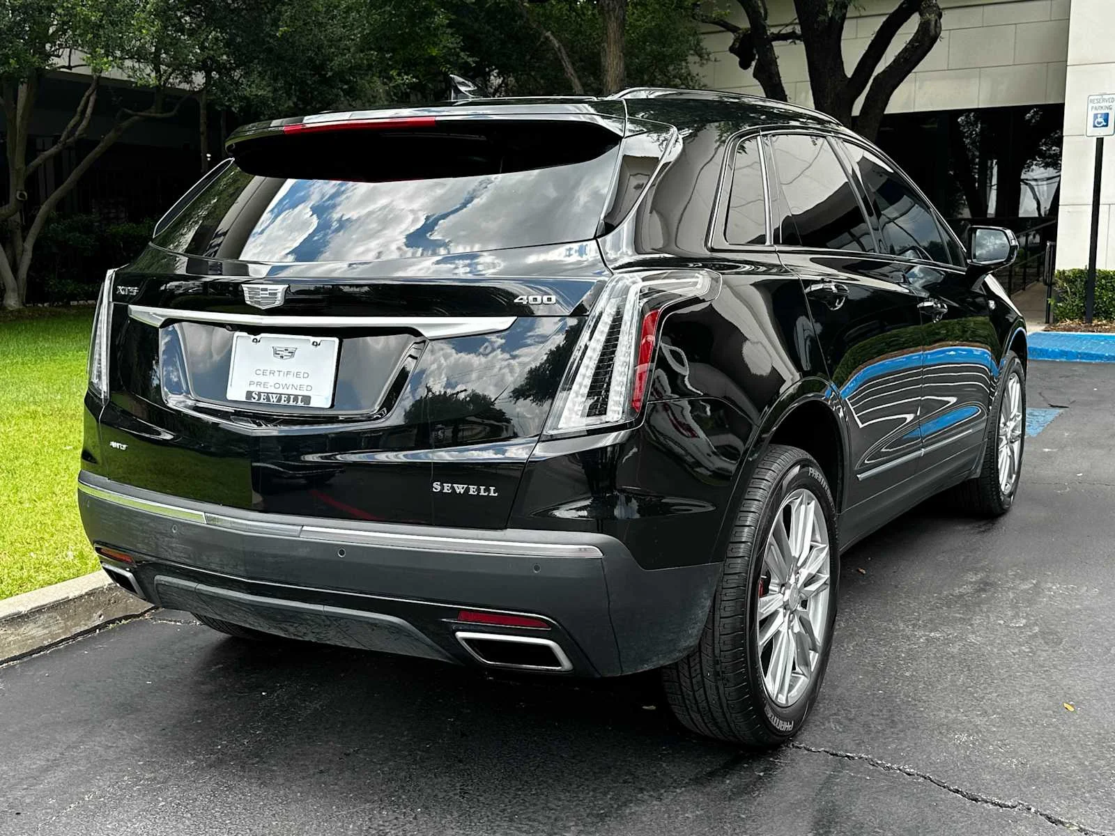 Certified Used 2024 Stellar Black Metallic Cadillac Sport image 4