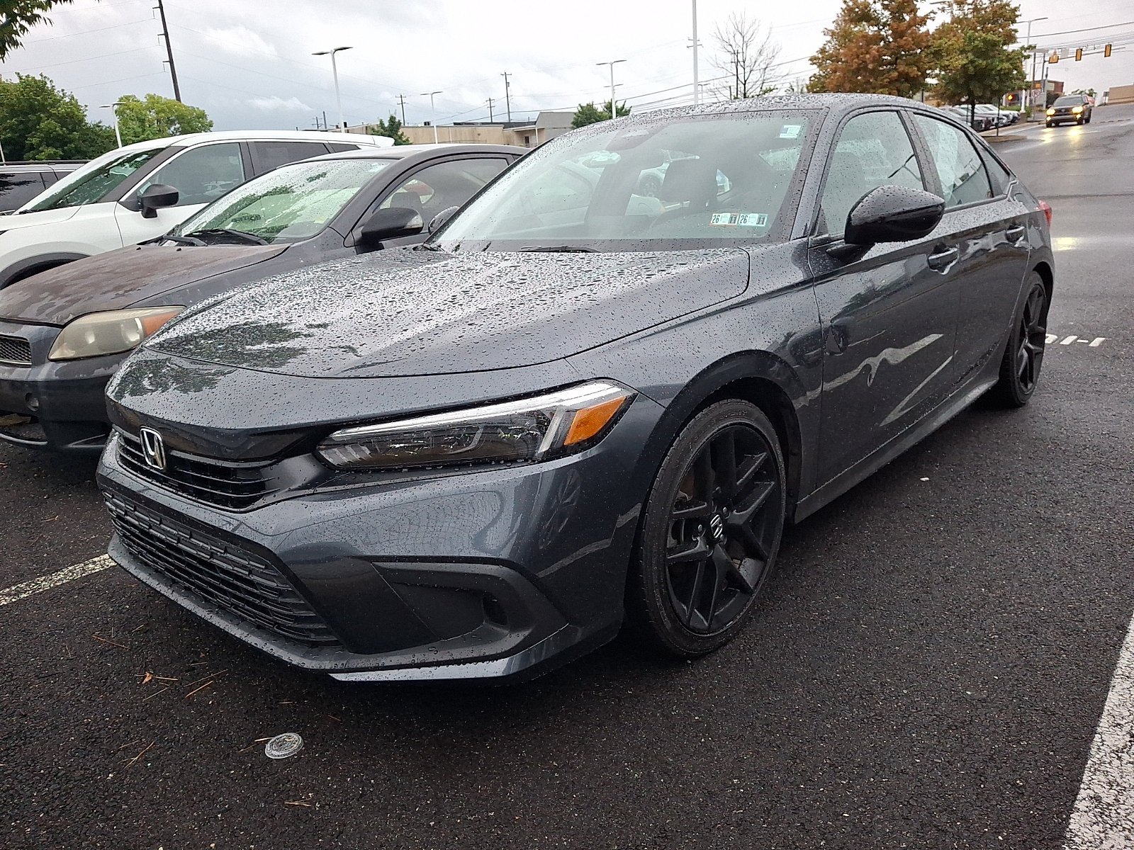 Used 2024 Meteorite Gray Honda Sport image 1