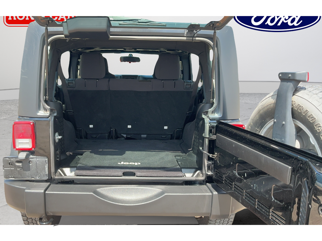 Used 2013 Black Jeep Unlimited Sport image 19