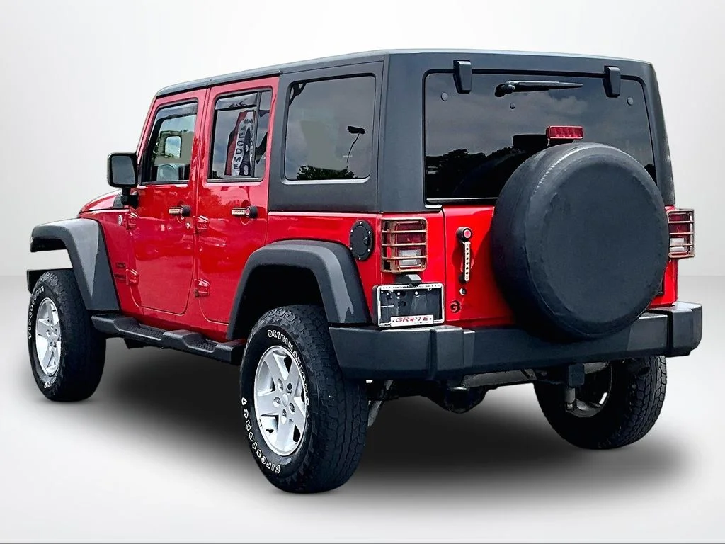 Used 2015 Red Jeep Unlimited Sport image 11