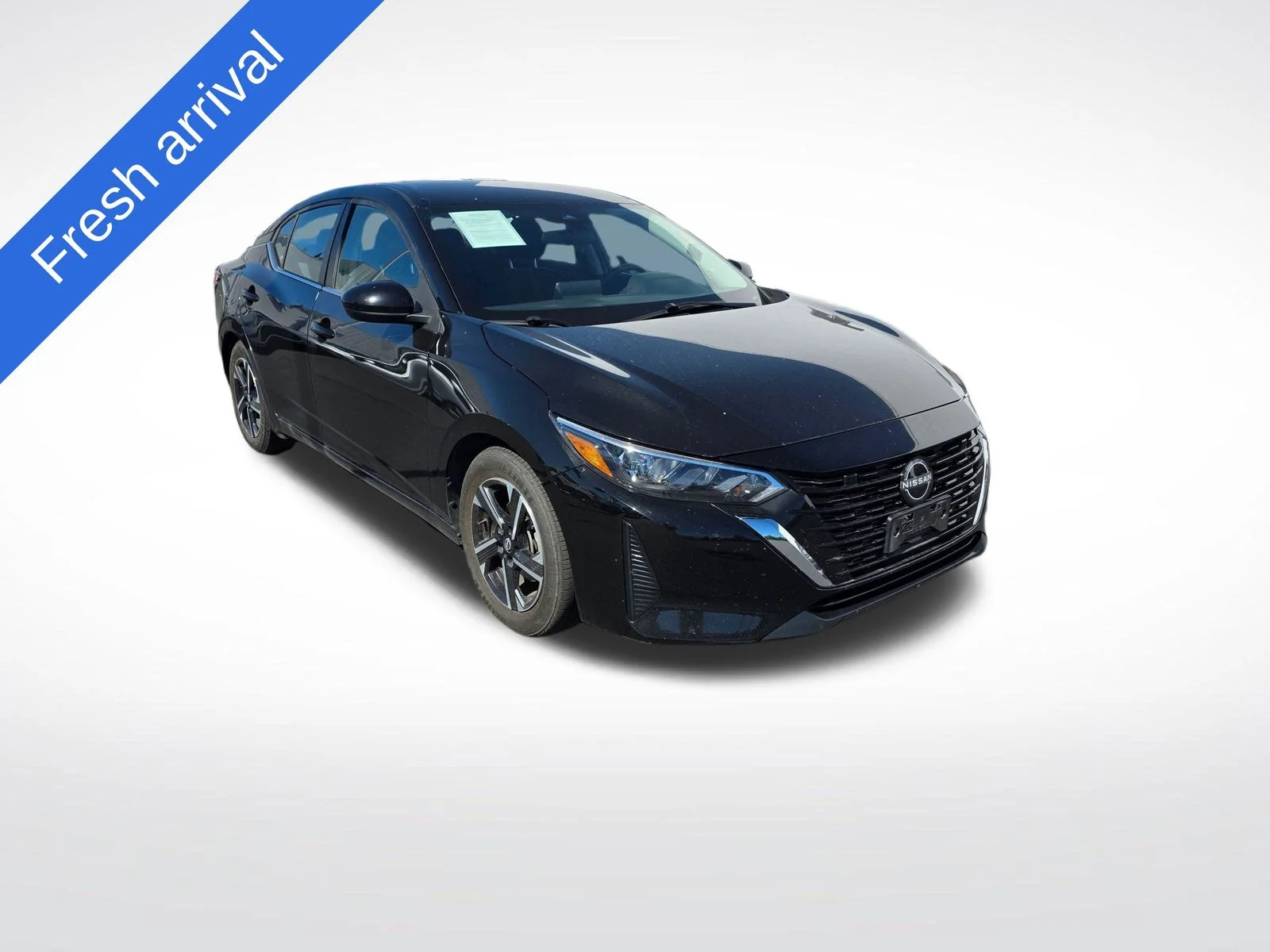 Used 2024 Super Black Nissan SV image 1