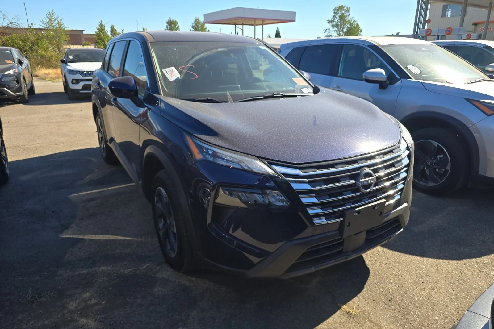 Used 2025 Deep Ocean Blue Pearl Nissan SV image 2