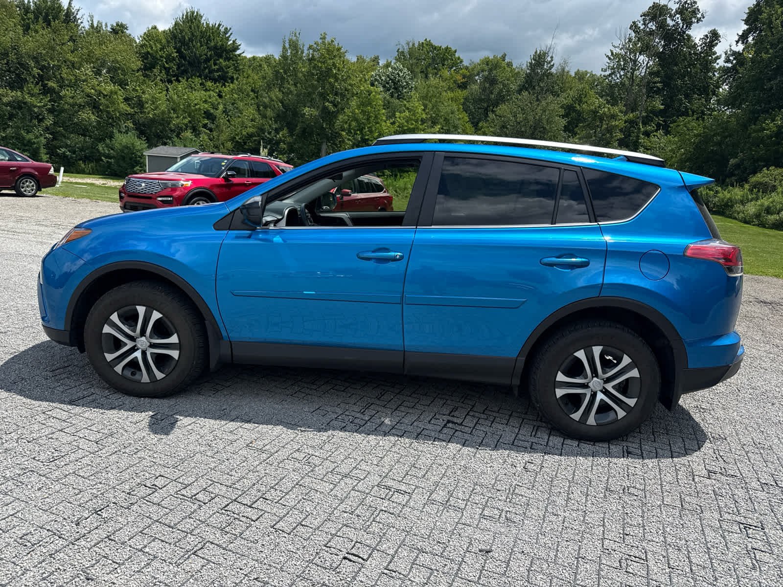 Used 2018 Electric Storm Blue Toyota LE image 5