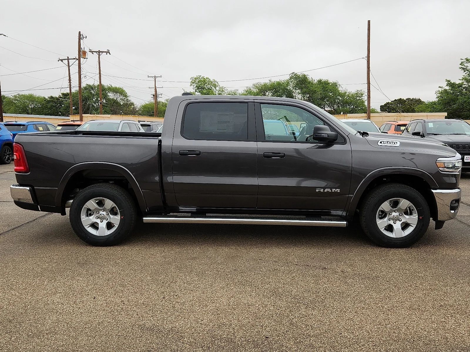 New 2026 Gray Ram LONE STAR CREW CAB 4X2 5