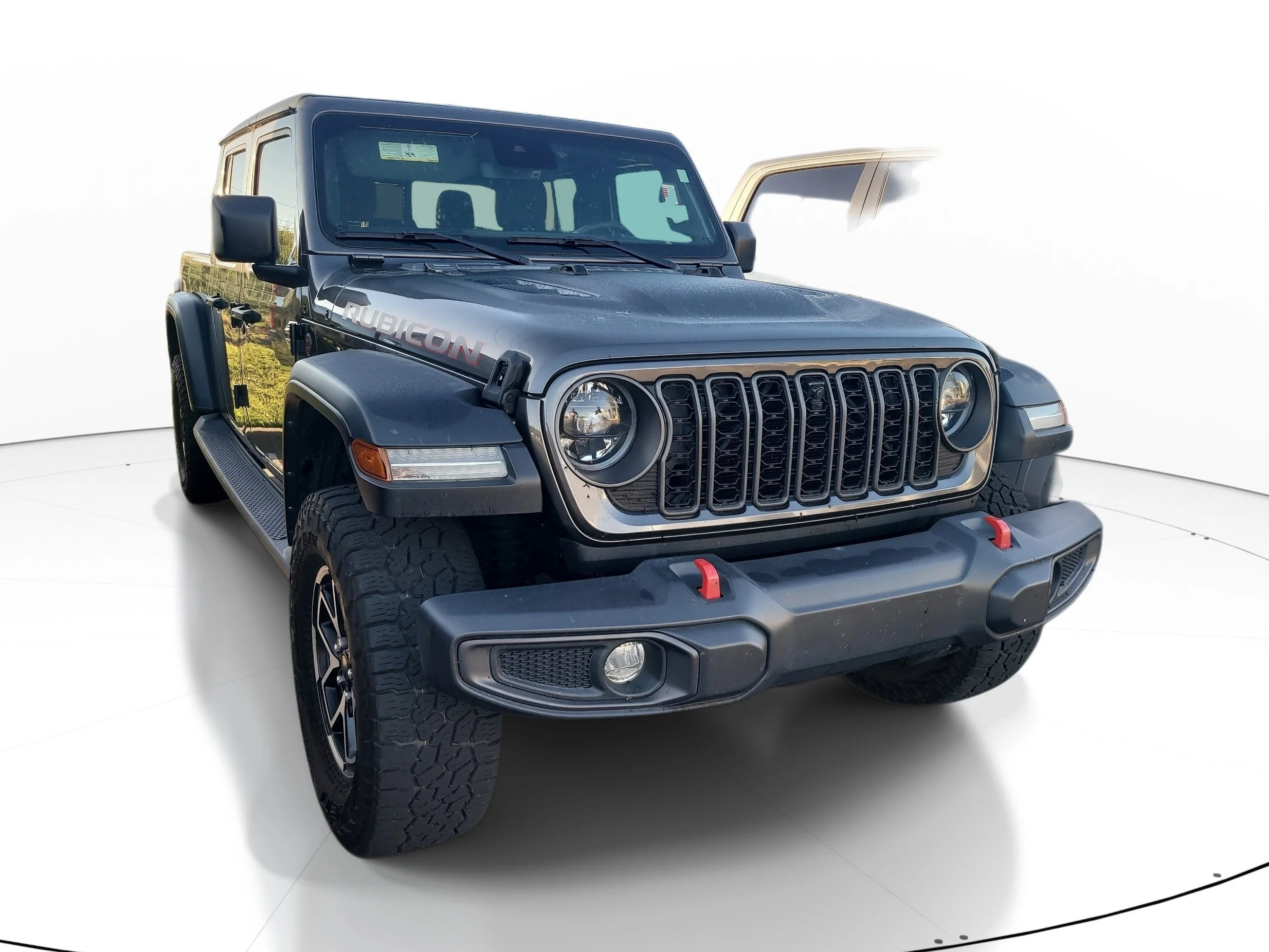 Used 2024 Granite Crystal Metallic Clearcoat Jeep Rubicon image 1