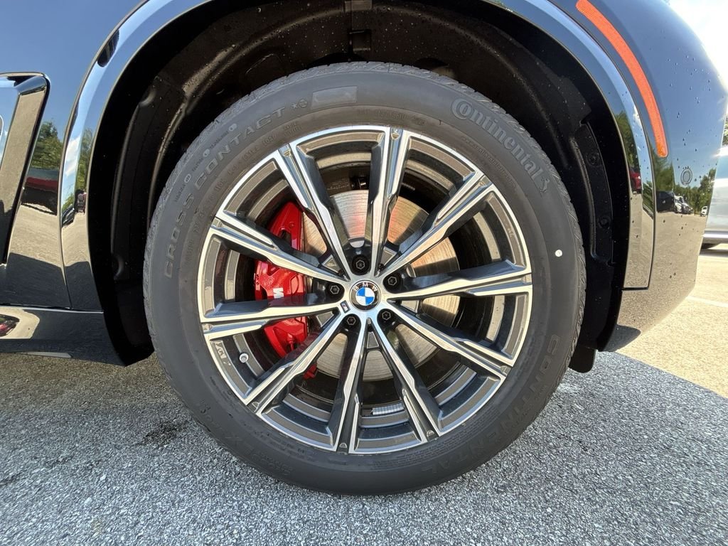 New 2026 Black Sapphire Metallic BMW xDrive50e image 19