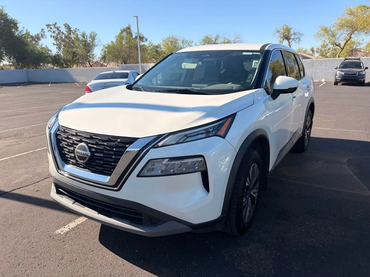 Used 2021 Pearl White Tricoat Nissan SV image 1