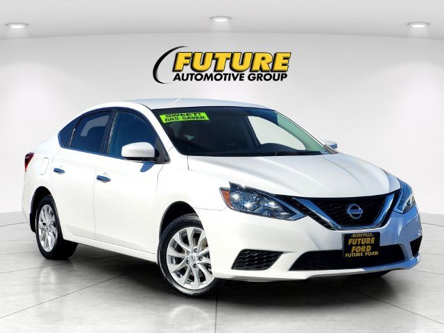 Used 2019 White Nissan SV image 1