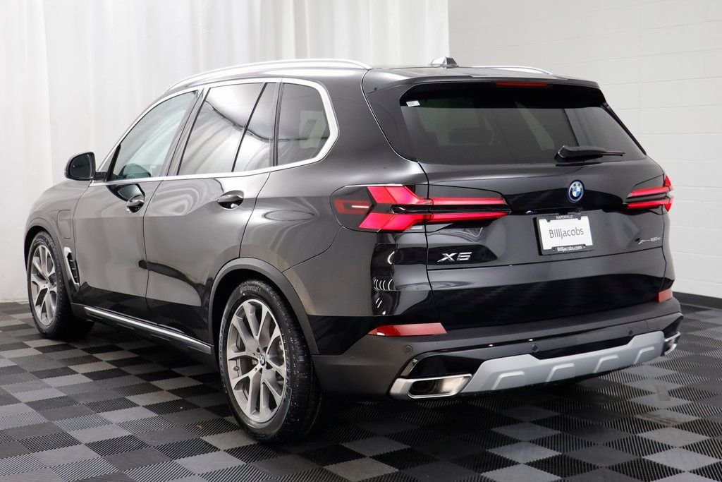 New 2026 Black Sapphire Metallic BMW xDrive50e image 14