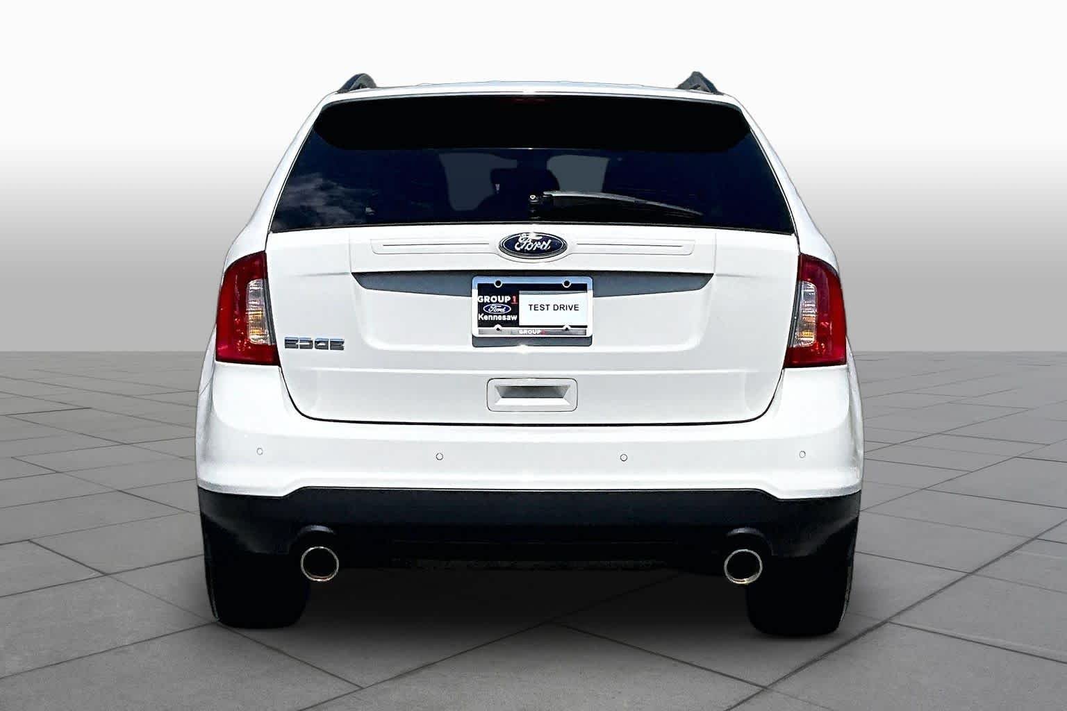 Used 2013 White Suede Ford SE image 4