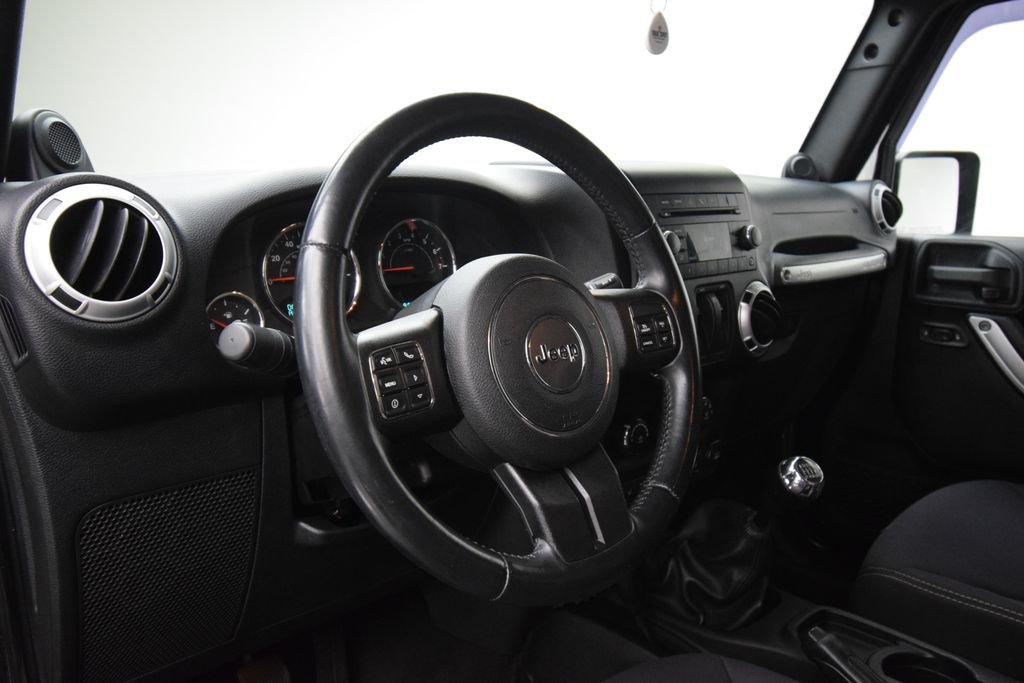 Used 2013 Black Jeep Sahara image 10