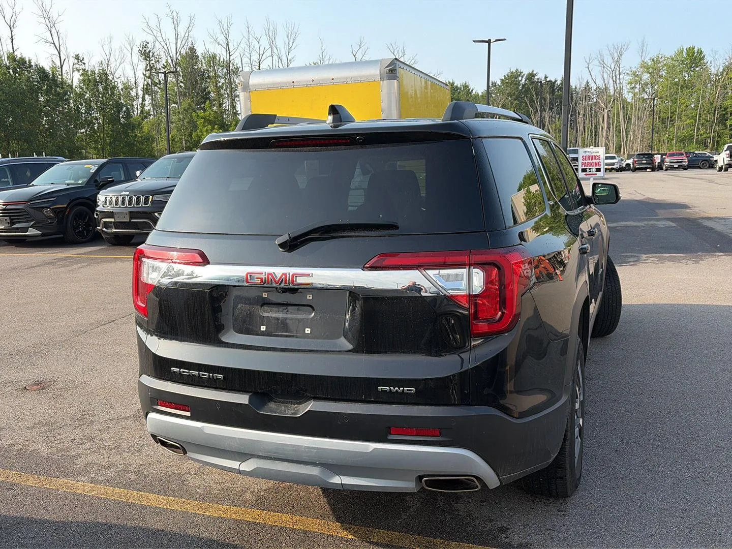 Used 2021 Ebony Twilight Metallic GMC SLE image 2