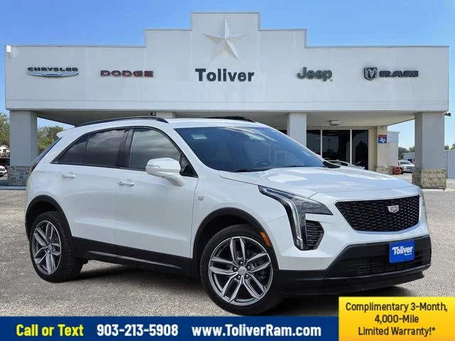 Used 2022 White Cadillac Sport image 1